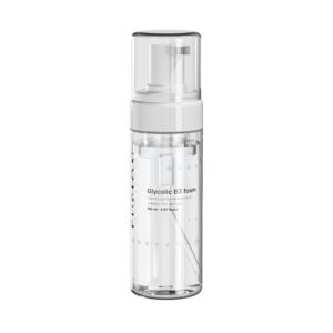 clear bottle containing exfolating cleansing foam