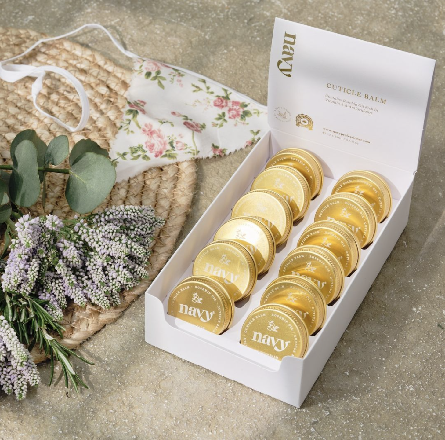 image showing navy professional cuticle balms displayed in a retail display available at Kolaine beauty lounge
